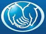 A blue and white logo of two hands holding each other.