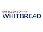 A white and blue logo for whitbread